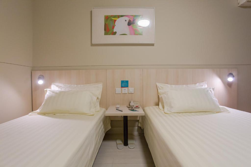Двухместный (Стандартный двухместный номер «С» с 2 отдельными кроватями) отеля Jinjiang Inn - Beijing Daxing Development Zone, Дасин