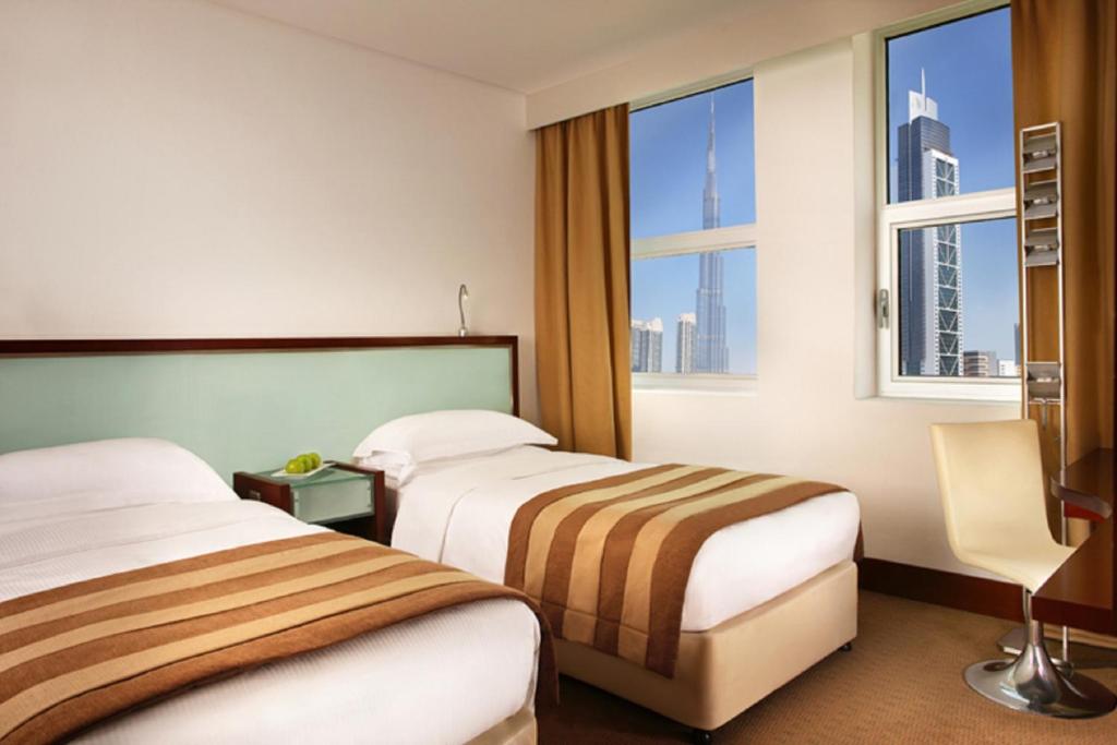 Сьюит (Люкс «Бурдж» – 2 отдельные кровати) апарт-отеля Villa Rotana - Dubai, Дубай