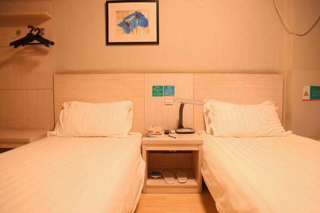 Двухместный (Двухместный номер А с 2 отдельными кроватями) отеля Jinjiang Inn - Beijing Houhai, Пекин