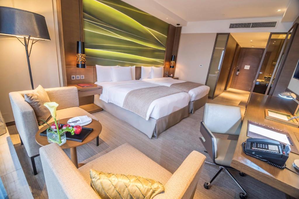 Двухместный (Номер Делюкс с кроватью размера «king-size») отеля Marco Polo Ortigas Manila, Манила