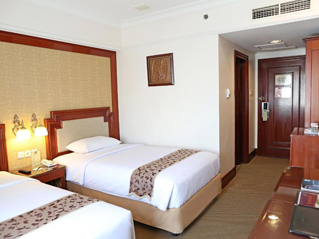 Двухместный (Двухместный номер с 1 кроватью или 2 отдельными кроватями) отеля Golden Boutique Hotel Melawai, Джакарта