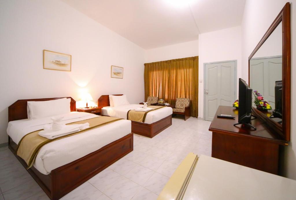 Двухместный (Двухместный номер Делюкс с 2 отдельными кроватями) отеля Fujairah Hotel & Resort, Фуджейра