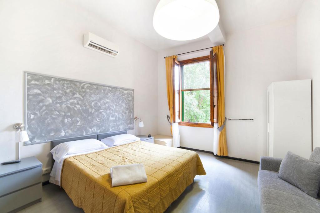 Двухместный (Двухместный номер с 1 кроватью или 2 отдельными кроватями, общая ванная комната) отеля Melody House, Флоренция