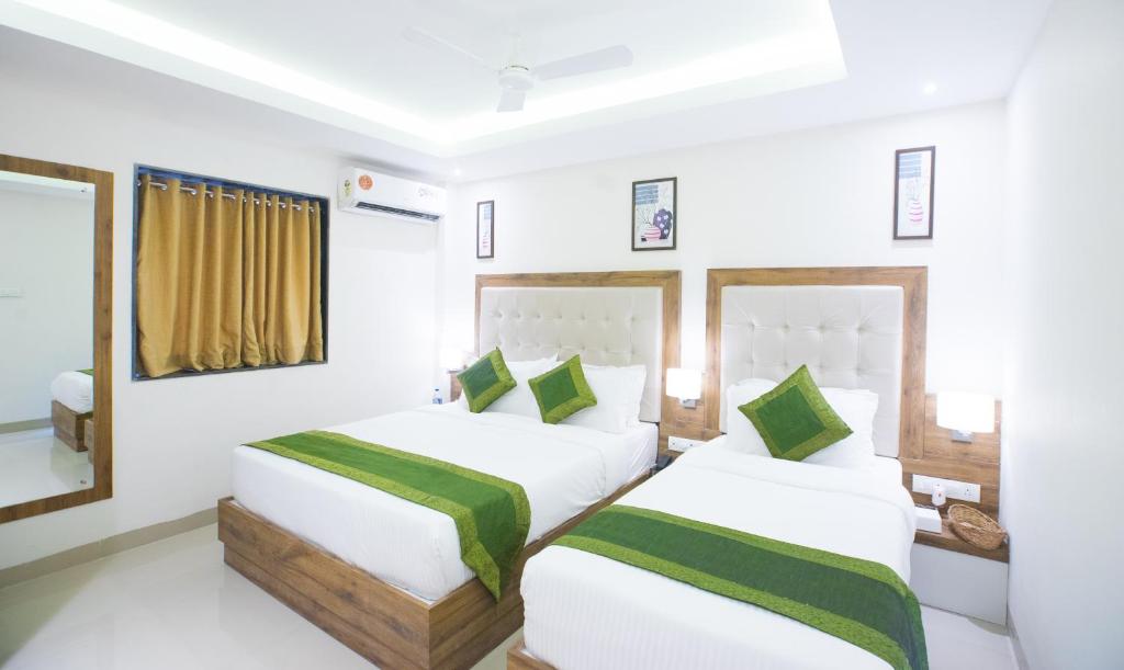 Двухместный (Двухместный номер Делюкс с 1 кроватью) отеля Treebo Amber International, Мумбай