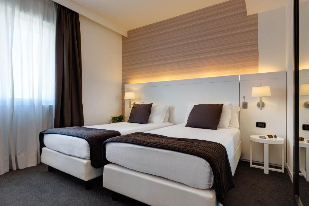 Двухместный (Двухместный номер с 2 отдельными кроватями) отеля IH Hotels Roma Z3, Рим