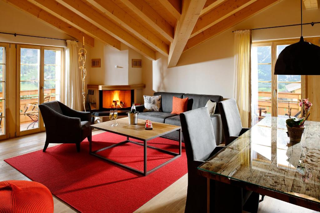 Сьюит (Суперлюкс с балконом и видом на горы) отеля Aspen Alpine Lifestyle Hotel, Гриндельвальд