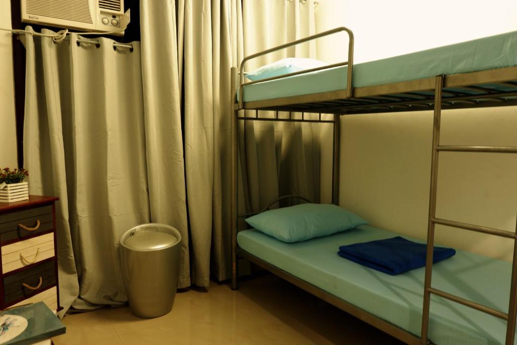 Номер (Кровать в общем номере для мужчин и женщин с 10 кроватями) хостела Transit Point Hostel Mactan Cebu, Мактан
