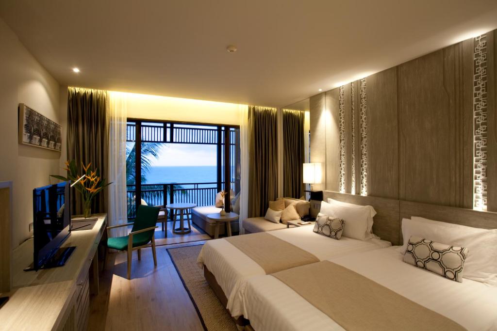 Двухместный (Двухместный номер Делюкс с 1 кроватью или 2 отдельными кроватями, вид на океан) отеля Pullman Phuket Arcadia Naithon Beach, Пхукет