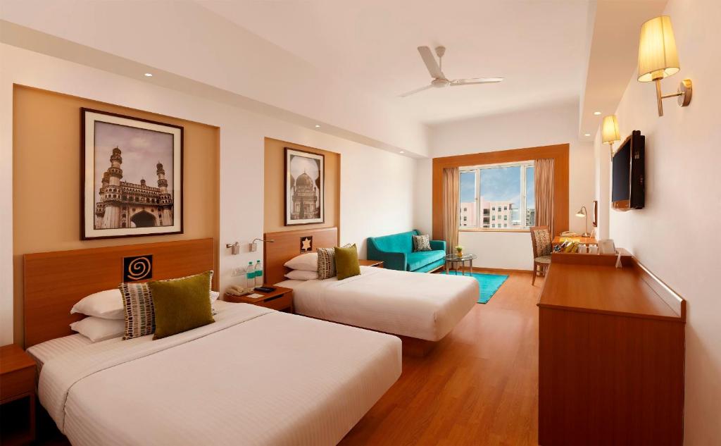 Двухместный (Двухместный номер бизнес-класса с 1 кроватью или 2 отдельными кроватями) отеля Lemon Tree Premier Hitec City Hyderabad, Хайдарабад