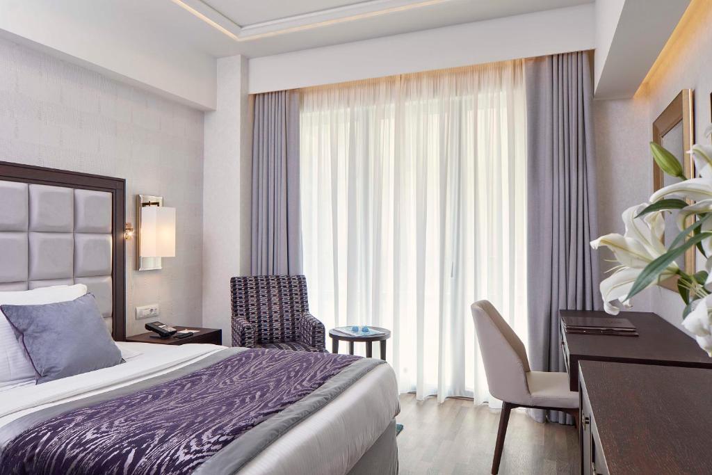 Двухместный (Классический двухместный номер с 1 кроватью или 2 отдельными кроватями) отеля Electra Metropolis, Афины