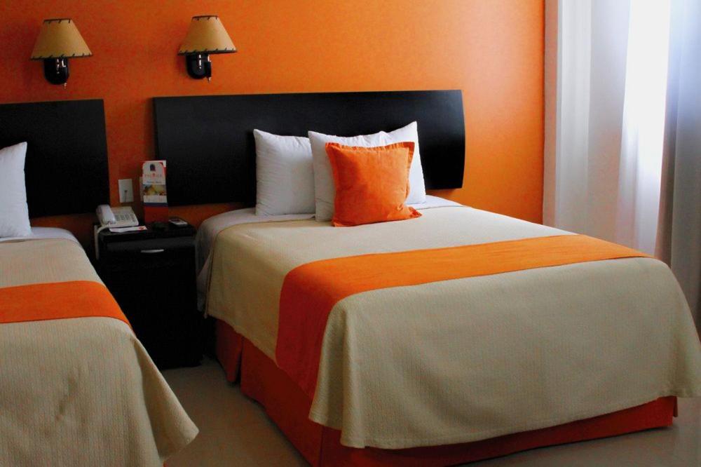 Двухместный (Двухместный номер с 2 двуспальными кроватями) отеля Hotel Baez Paraiso, Параисо
