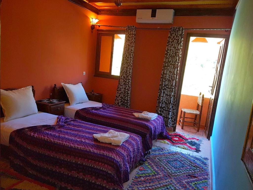 Двухместный (Двухместный номер с 1 кроватью или 2 отдельными кроватями и балконом) отеля Atlas Imoula, Имлиль