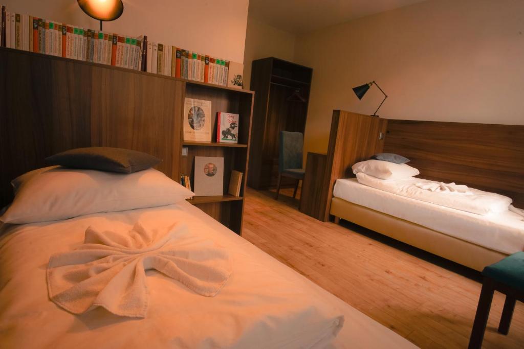 Двухместный (Двухместный номер эконом-класса с 2 отдельными кроватями) отеля Hotel Bett und Buch, Берлин