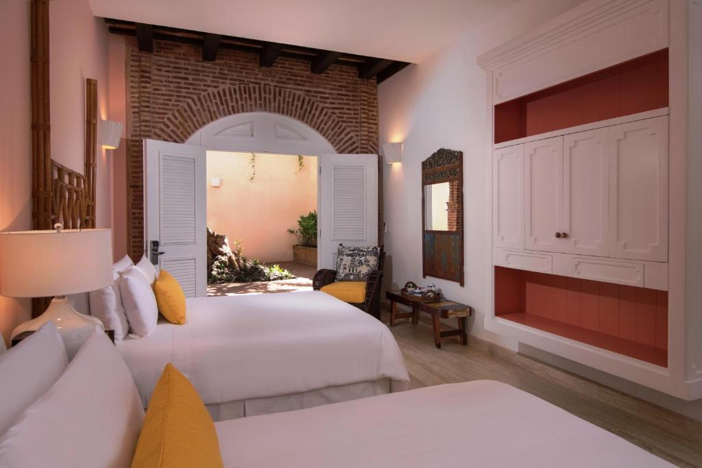 Двухместный (Роскошный номер с 2 кроватями размера «queen-size») отеля Casas del XVI Boutique Hotel, Санто-Доминго