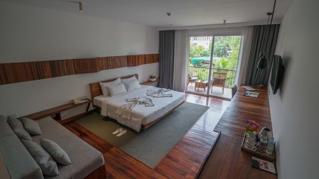 Двухместный (Представительский двухместный номер с 1 кроватью - Бесплатный трансфер в 2 стороны) курортного отеля Hotel Somadevi Angkor Boutique and Resort, Сием Рип