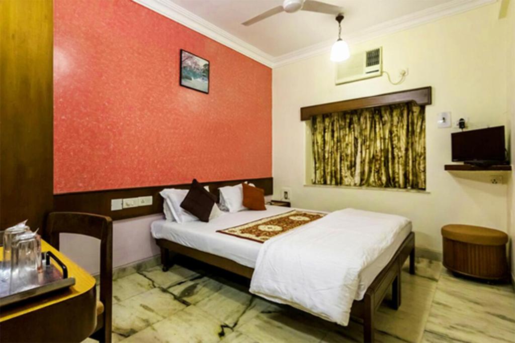 Двухместный (Двухместный номер Делюкс с 1 кроватью) отеля Hotel Mogul Palace, Мумбай