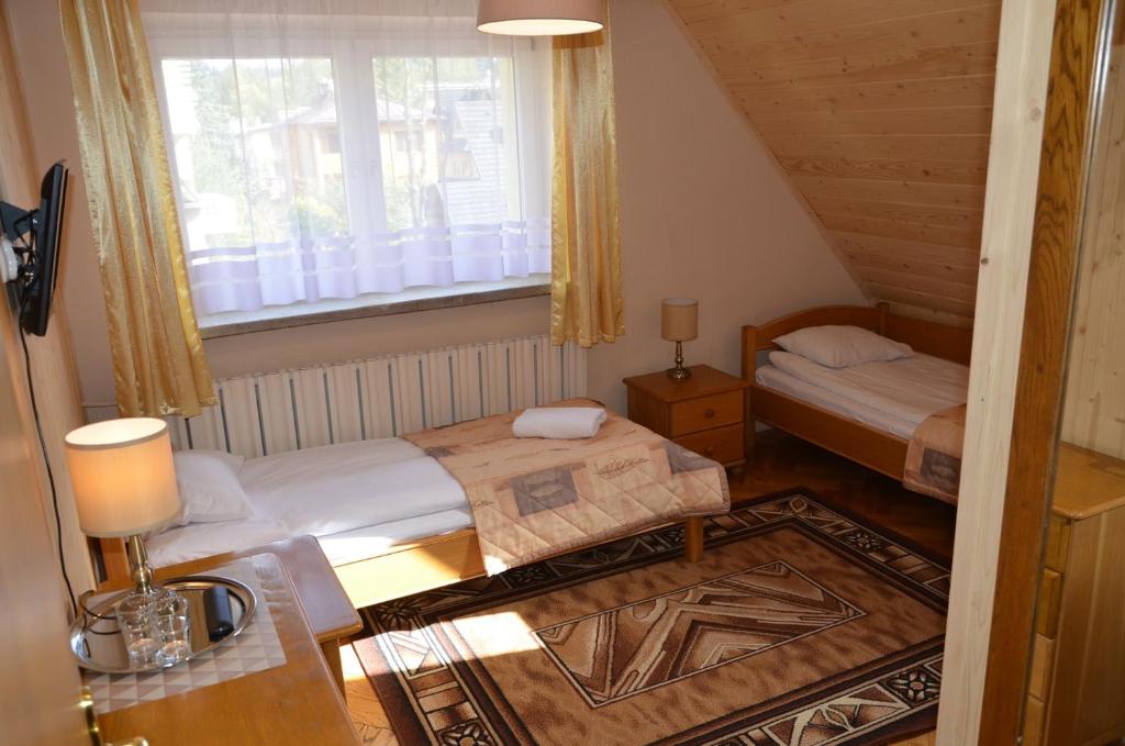 Двухместный (Двухместный номер с 2 отдельными кроватями) гостевого дома Pensjonat Adria, Закопане