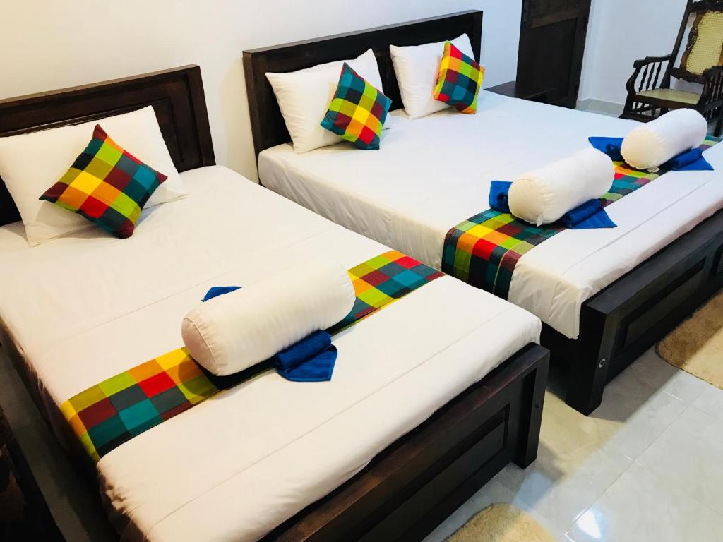 Трехместный (Трехместный номер Делюкс) гостевого дома Pearl House Resort, Анурадхапура