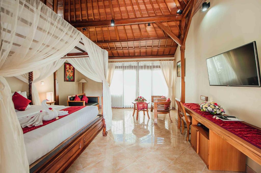 Двухместный (Роскошные бунгало с террасой) курортного отеля Kuta Puri Bungalow, Кута