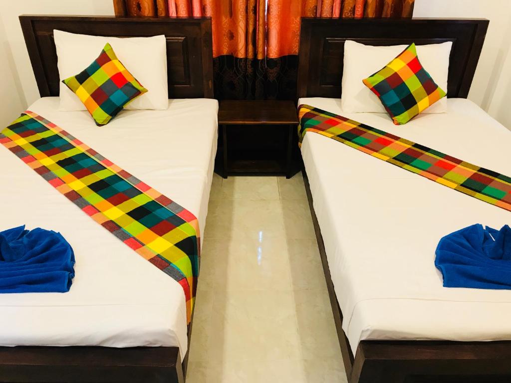 Двухместный (Двухместный номер Делюкс с 2 отдельными кроватями) гостевого дома Pearl House Resort, Анурадхапура