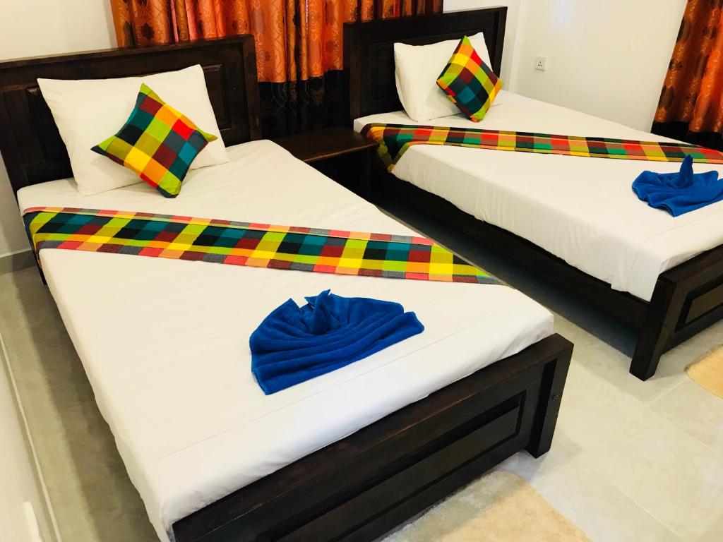 Двухместный (Двухместный номер с 2 отдельными кроватями и балконом) гостевого дома Pearl House Resort, Анурадхапура