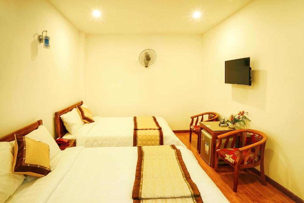 Двухместный (Двухместный номер Делюкс с 1 кроватью или 2 отдельными кроватями) отеля Thanh Thanh Hotel, Куинён