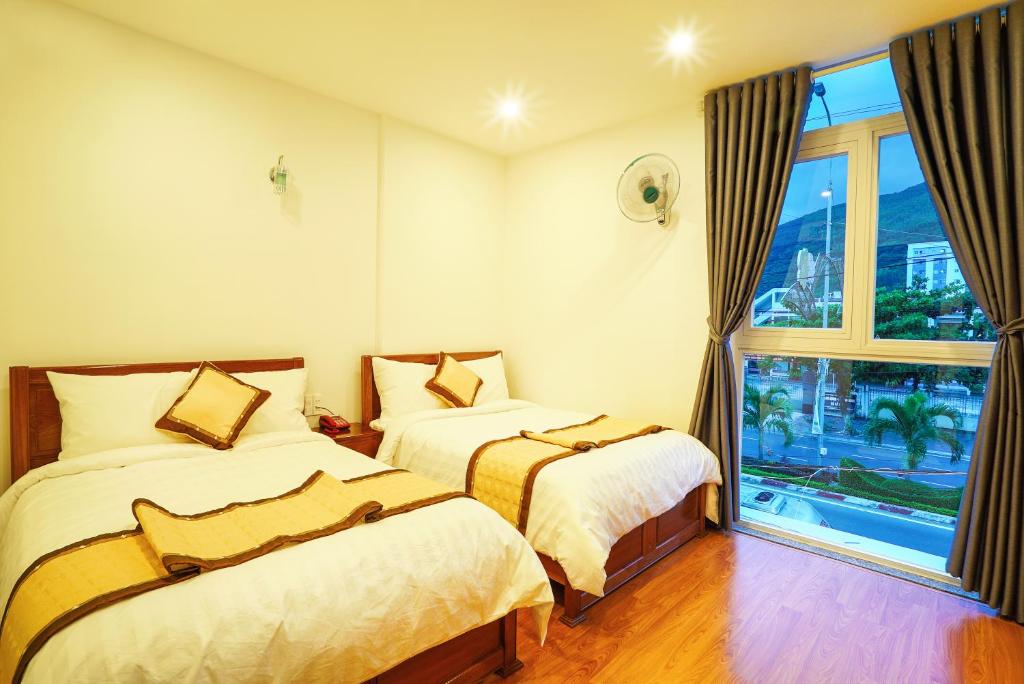 Двухместный (Улучшенный двухместный номер с 1 кроватью или 2 отдельными кроватями, вид на горы) отеля Thanh Thanh Hotel, Куинён