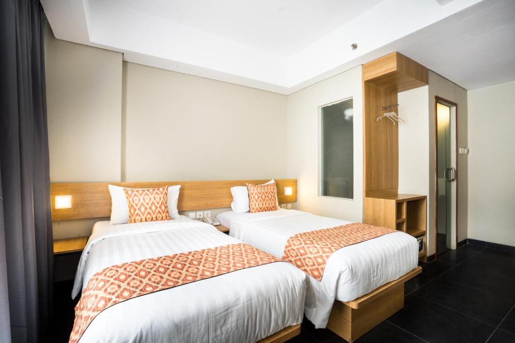 Двухместный (Улучшенный двухместный номер с 1 кроватью или 2 отдельными кроватями) отеля Maple Hotel Grogol, Джакарта