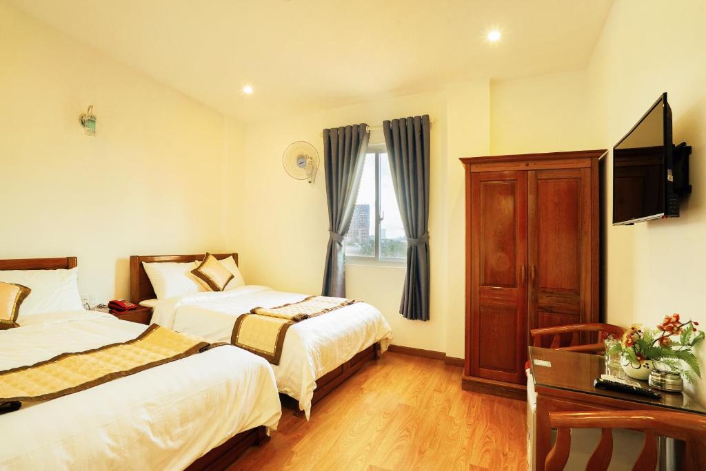 Двухместный (Двухместный номер с 2 отдельными кроватями и видом на море) отеля Thanh Thanh Hotel, Куинён