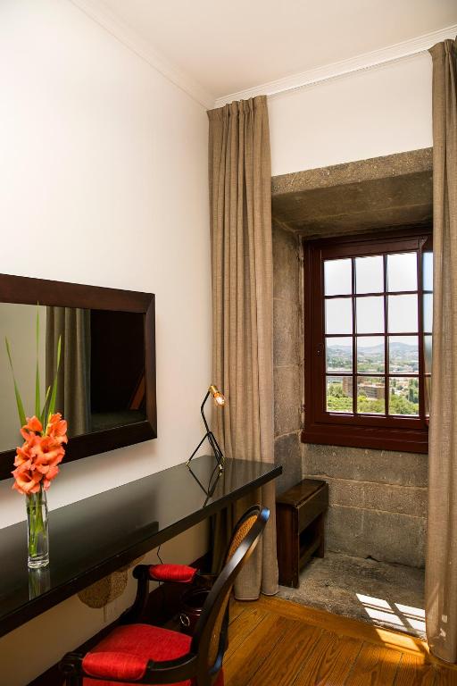 Двухместный (Улучшенный двухместный номер с 1 кроватью или 2 отдельными кроватями) отеля Pousada Mosteiro de Guimaraes, Гимарайнш