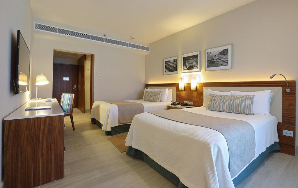 Двухместный (Двухместный номер Делюкс с 1 кроватью) курортного отеля Emporio Cancun, Канкун