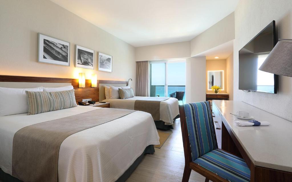 Двухместный (Двухместный номер Делюкс с 1 кроватью и видом на море) курортного отеля Emporio Cancun, Канкун