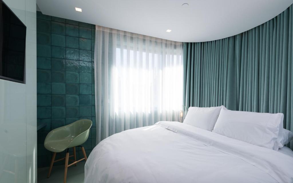 Двухместный (Двухместный номер Делюкс с 1 кроватью) отеля Beautique WC Hotel, Лиссабон