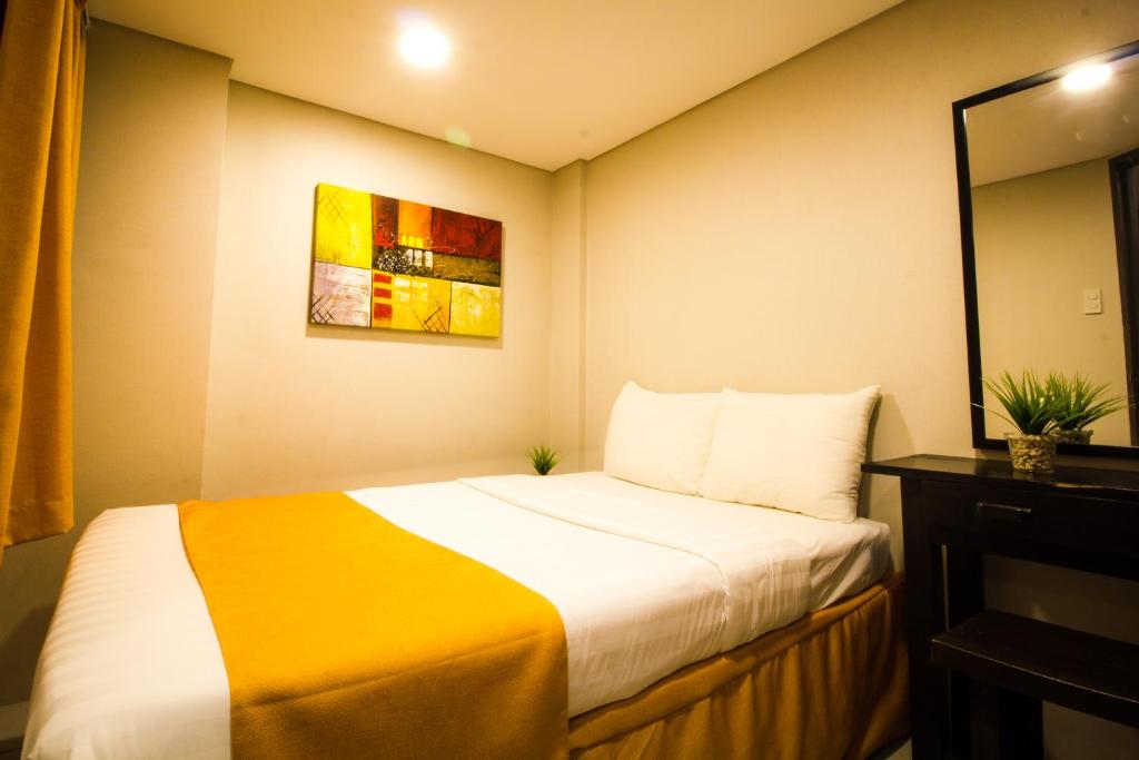 Сьюит (Четырехместный номер Делюкс) отеля Jade Hotel and Suites, Манила