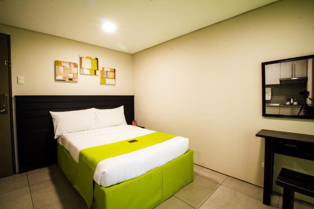 Двухместный (Двухместный номер Делюкс с 1 кроватью) отеля Jade Hotel and Suites, Манила