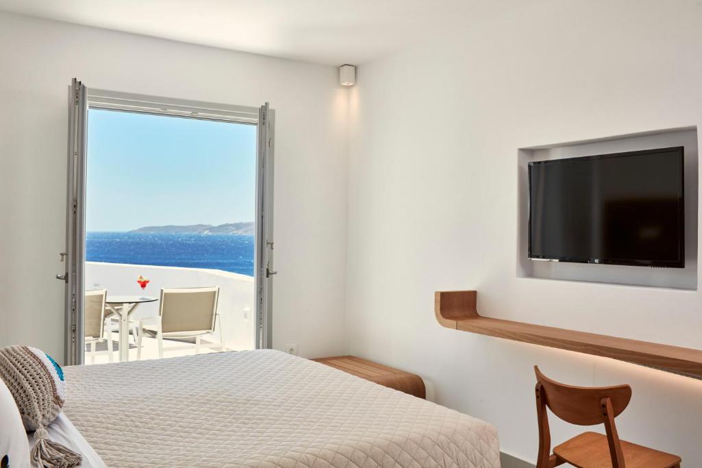 Двухместный (Улучшенный двухместный номер с 1 кроватью) отеля Manoula's Beach Mykonos Resort, Агиос-Иоаннис