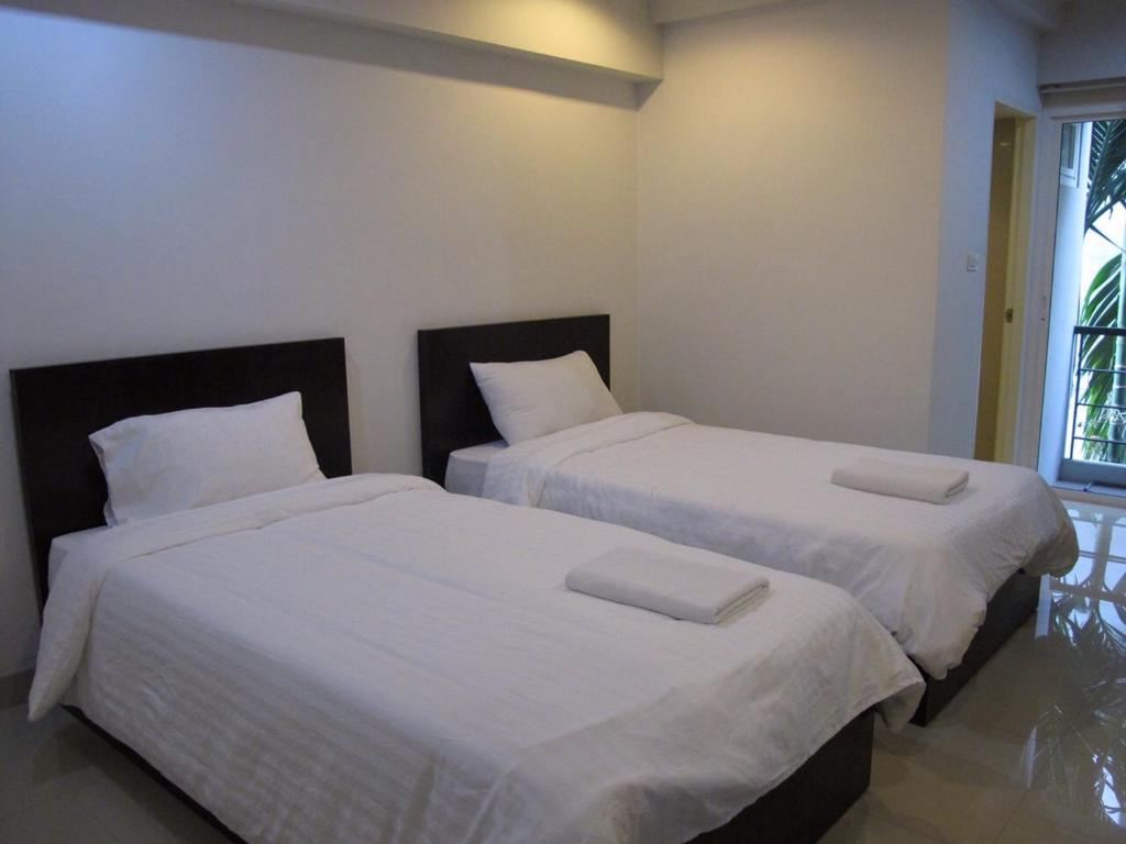 Двухместный (Стандартный двухместный номер с 2 отдельными кроватями) апарт-отеля Delight Residence, Бангкок