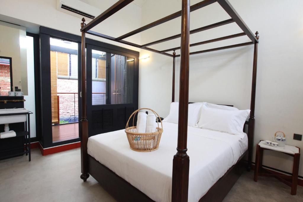 Двухместный (Двухместный номер Делюкс с 1 кроватью и балконом) отеля Tian Jing Hotel, Куала-Лумпур
