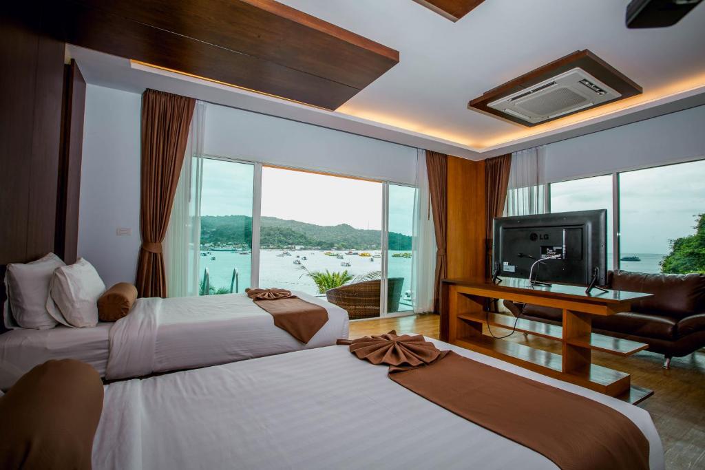 Двухместный (Роскошный двухместный номер с 2 отдельными кроватями, бассейном и видом на море) отеля Phi Phi Cliff Beach Resort, Пхи-Пхи