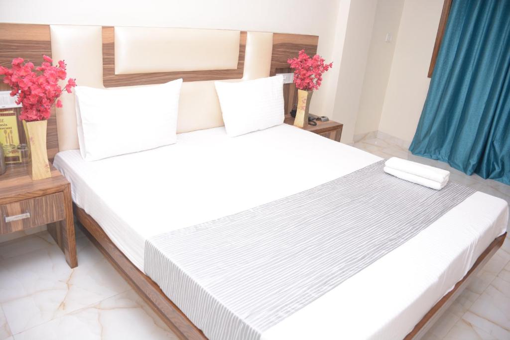 Двухместный (Двухместный номер Делюкс с 1 кроватью и дополнительной кроватью) отеля Hotel Golden Oasis, Нью-Дели