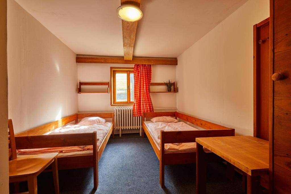 Двухместный (Двухместный номер эконом-класса с 1 кроватью или 2 отдельными кроватями) отеля Horský hotel Žižkova bouda, Пец под Снежкой