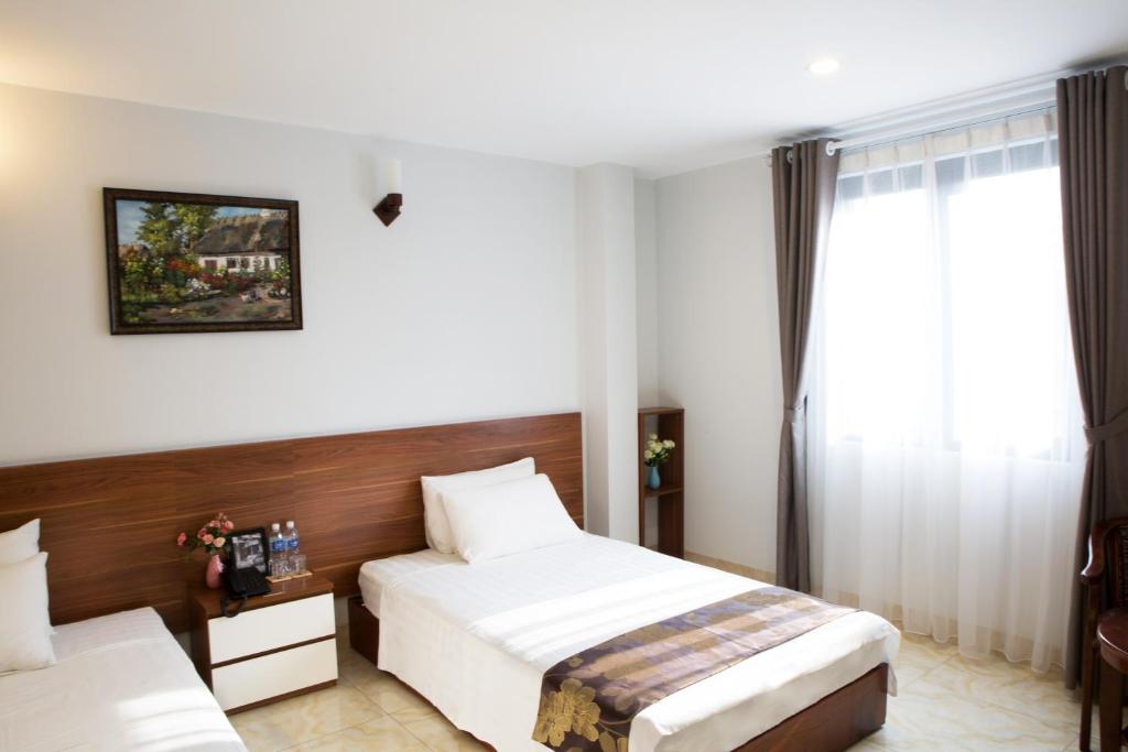 Двухместный (Двухместный номер Делюкс с 2 отдельными кроватями) отеля An Hotel, Ханой