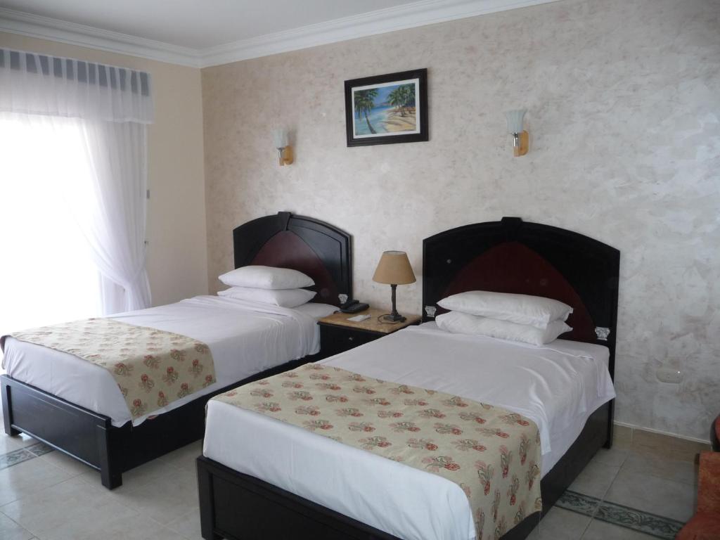Двухместный (Стандартный двухместный номер с 1 кроватью или 2 отдельными кроватями) курортного отеля Viva Sharm, Шарм-эль-Шейх