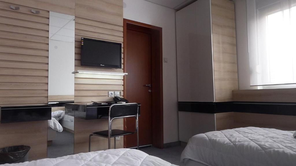 Двухместный (Двухместный номер с 1 кроватью или 2 отдельными кроватями) отеля Garni Hotel Consul, Ниш
