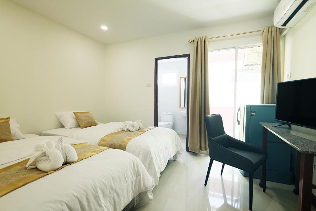 Двухместный (Двухместный номер с 2 отдельными кроватями и собственной ванной комнатой) хостела Happy Hostel, Паттайя