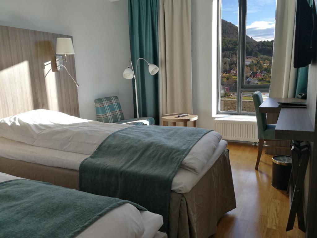 Двухместный (Улучшенный двухместный номер с 2 отдельными кроватями) отеля Dombås Hotel, Домбас