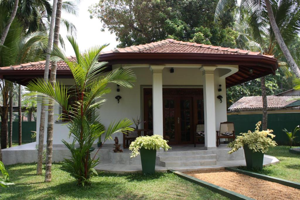 Номер (Бунгало Делюкс с видом на сад) гостевого дома Aliya Lanka, Берувала