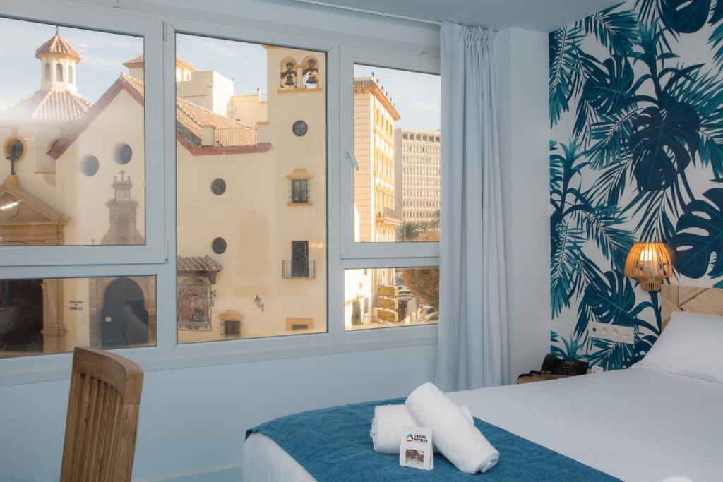Двухместный (Двухместный номер Делюкс с 2 отдельными кроватями) отеля Casual Málaga del Mar, Малага