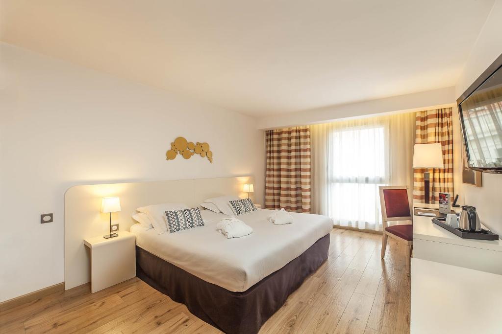 Двухместный (Улучшенный двухместный номер с 1 кроватью и правом бесплатного посещения спа-салона) отеля Hôtel Montaigne & Spa, Канны
