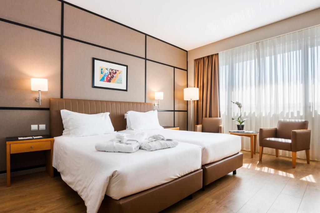Двухместный (Стандартный двухместный номер с 2 отдельными кроватями) отеля Hotel Quality Inn Portus Cale, Порту